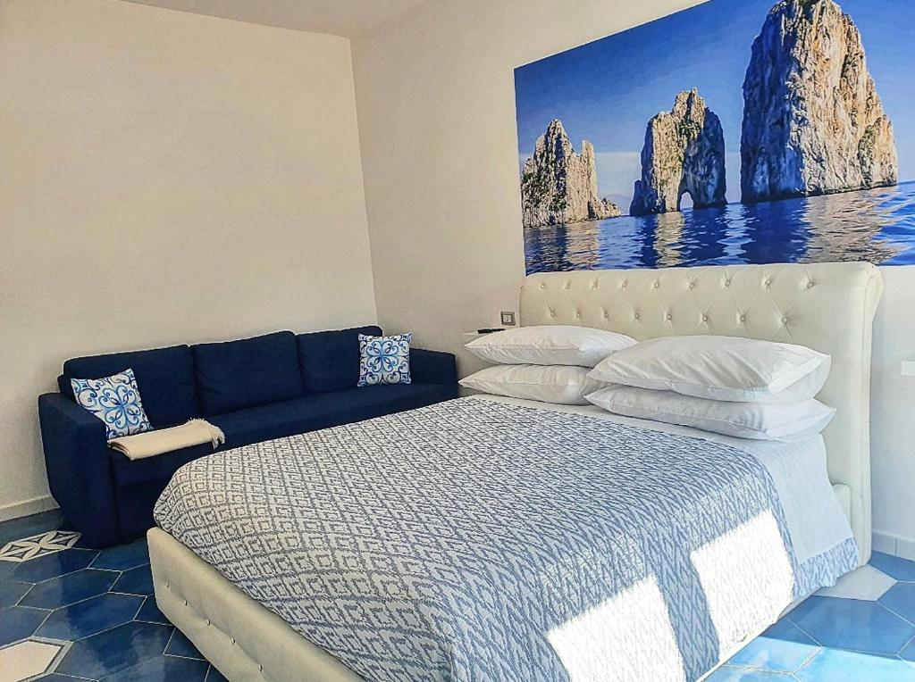 Posteľ alebo postele v izbe v ubytovaní Setteabbracci Suite & Apartments