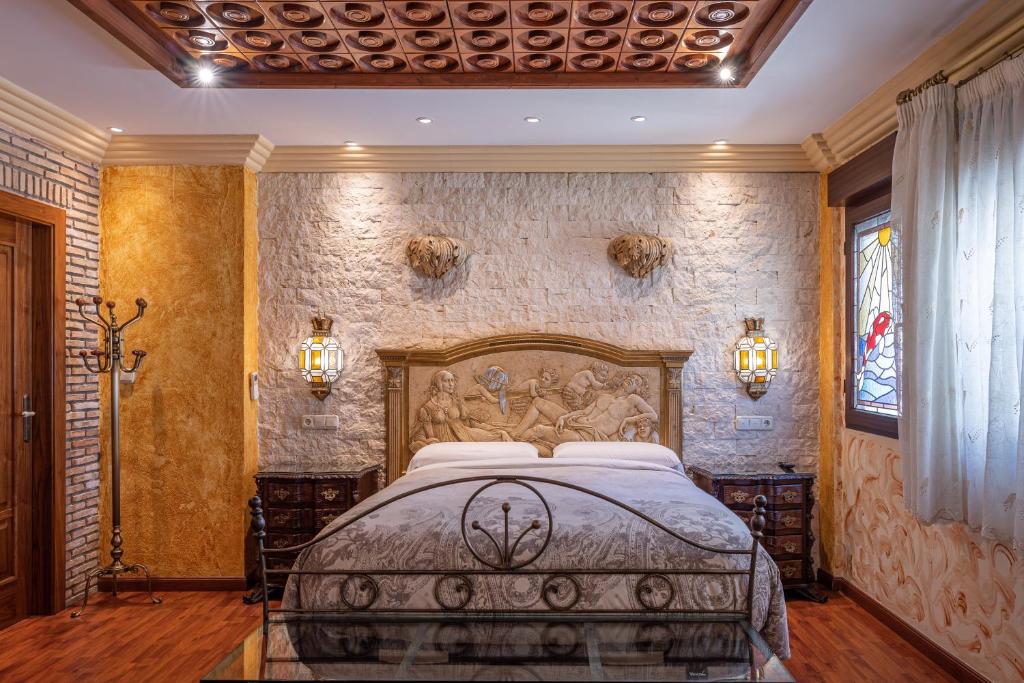 Postel nebo postele na pokoji v ubytování Casa de Reyes