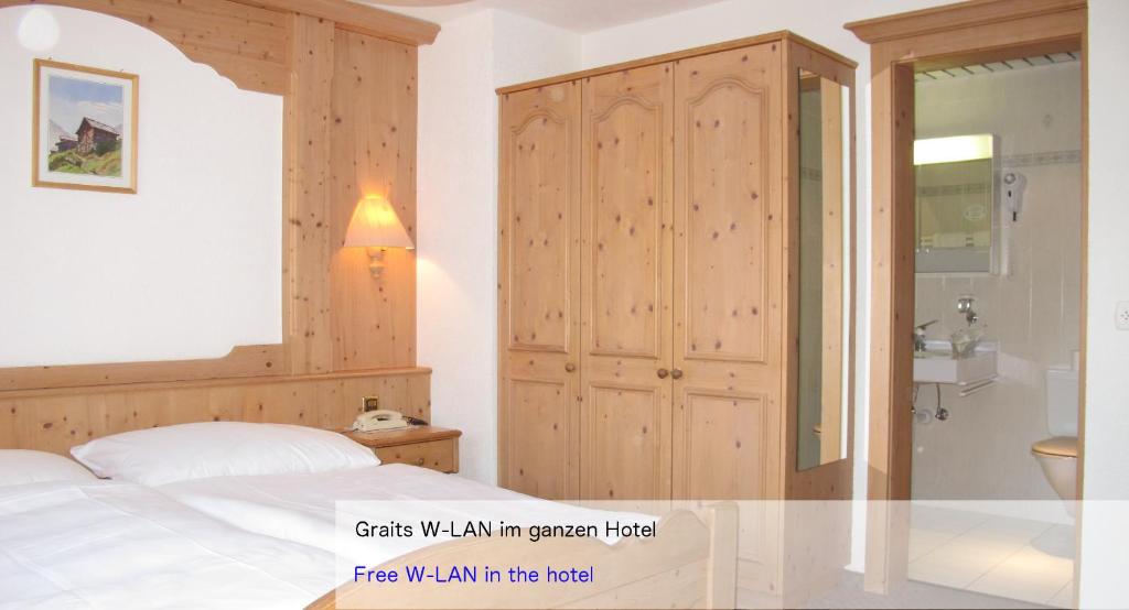 Ein Bett oder Betten in einem Zimmer der Unterkunft Hotel Restaurant Mattmarkblick