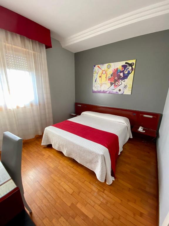 Postel nebo postele na pokoji v ubytování Hotel Master