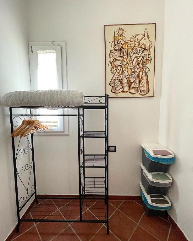 Postel nebo postele na pokoji v ubytování Dolce Vita Suite Alghero