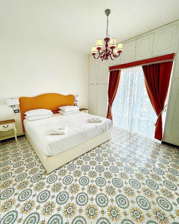 Postel nebo postele na pokoji v ubytování Dolce Vita Suite Alghero