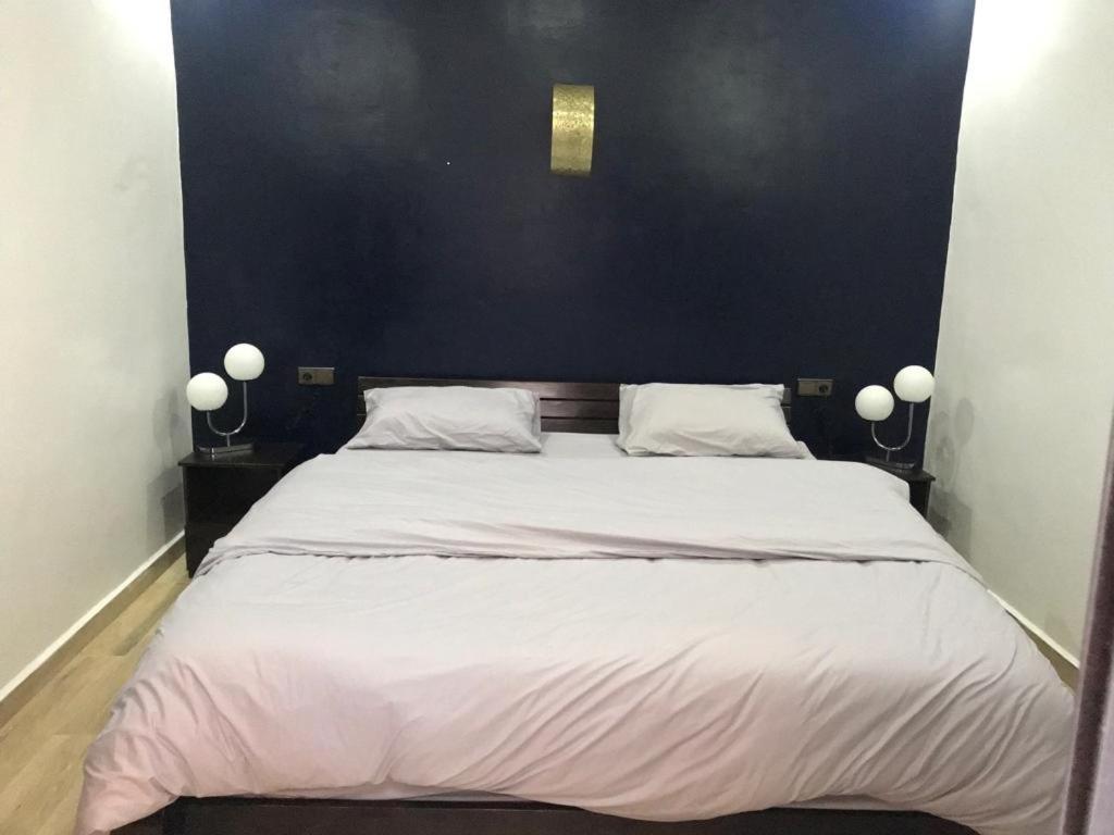 Кровать или кровати в номере Pedro Appartement