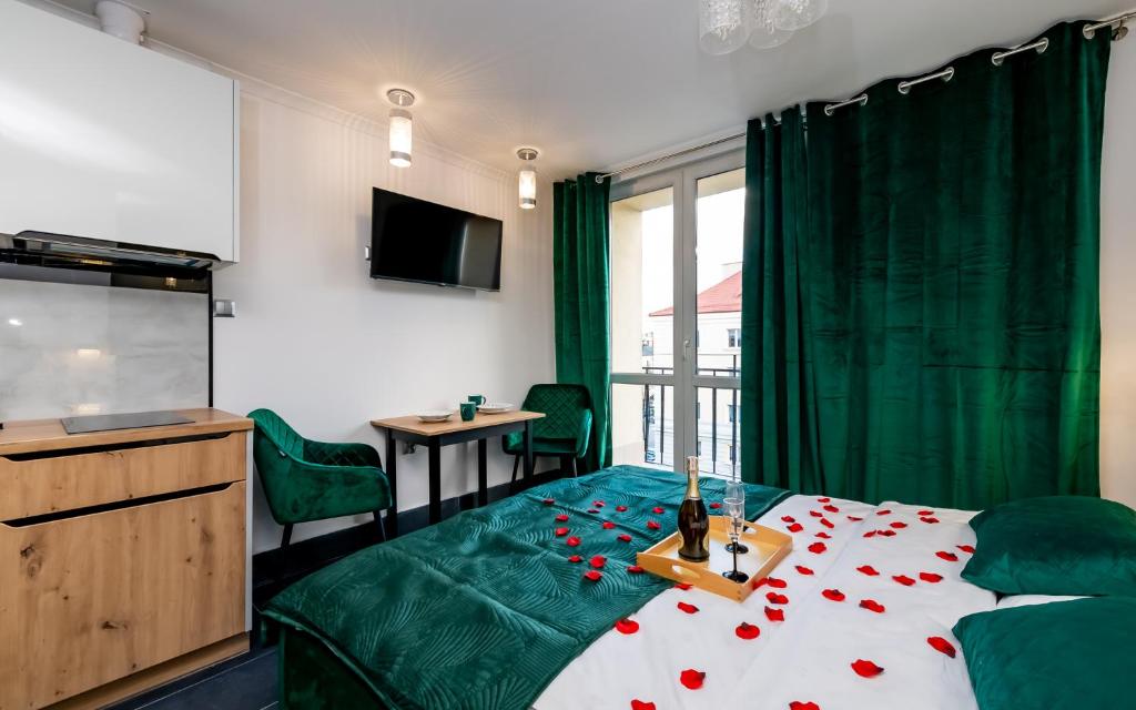 Posteľ alebo postele v izbe v ubytovaní Apartament Lipowa Love Rooms