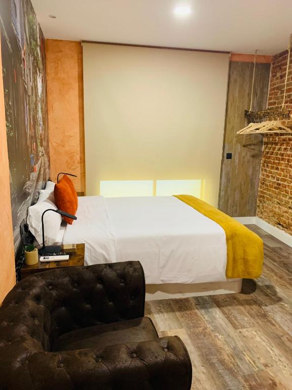 Postel nebo postele na pokoji v ubytování T-Homes Salamanca