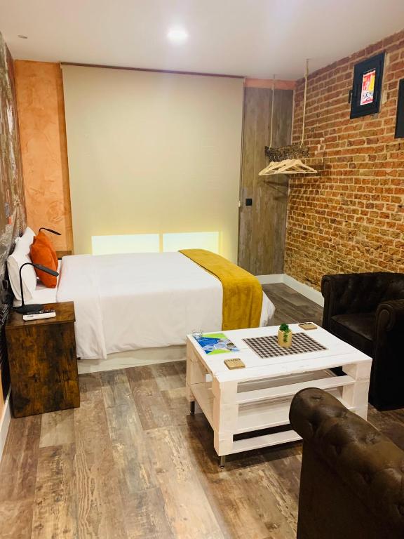 Postel nebo postele na pokoji v ubytování T-Homes Salamanca