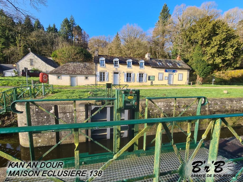 a view of the house from the river derwent at KAN AN DOUR in Laniscat