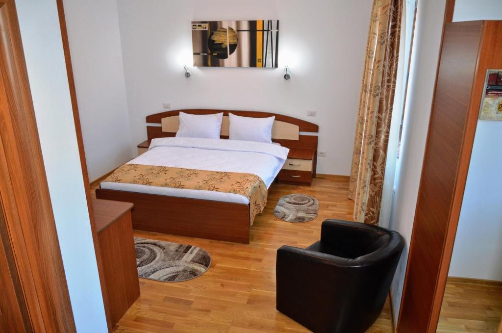 Postel nebo postele na pokoji v ubytování Casa Tibi - Sinaia