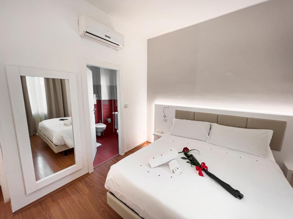 Postel nebo postele na pokoji v ubytování Hotel Gran Sasso & SPA
