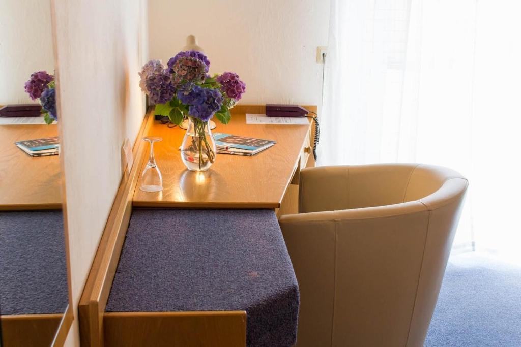 Posezení v ubytování Hotel Weinhaus Weis