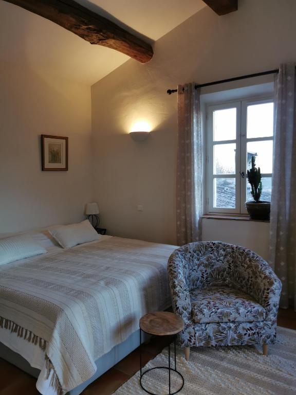 Postelja oz. postelje v sobi nastanitve Domaine GEODORA, Parfumeur en Provence