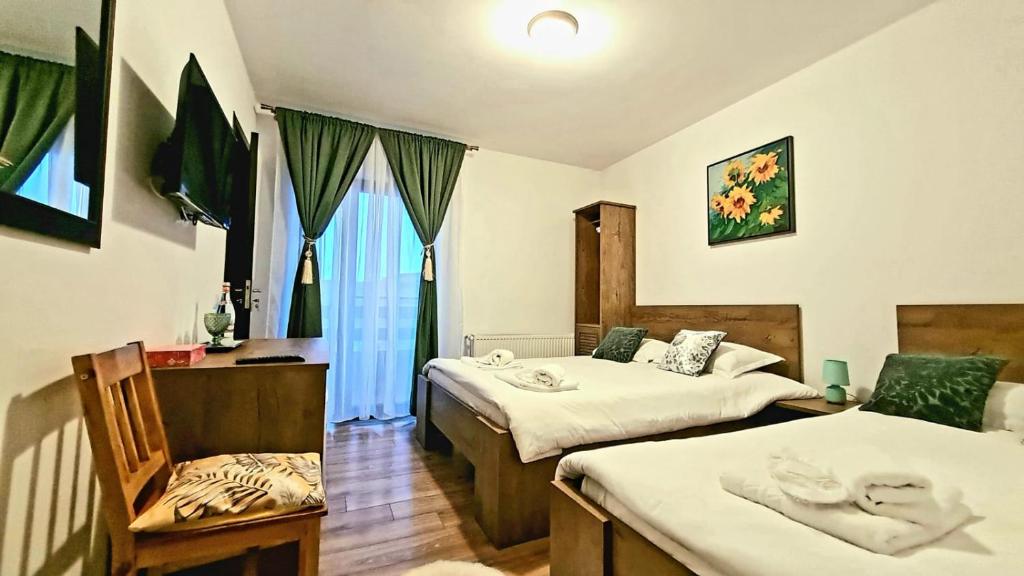 Postel nebo postele na pokoji v ubytování Mera Hills House