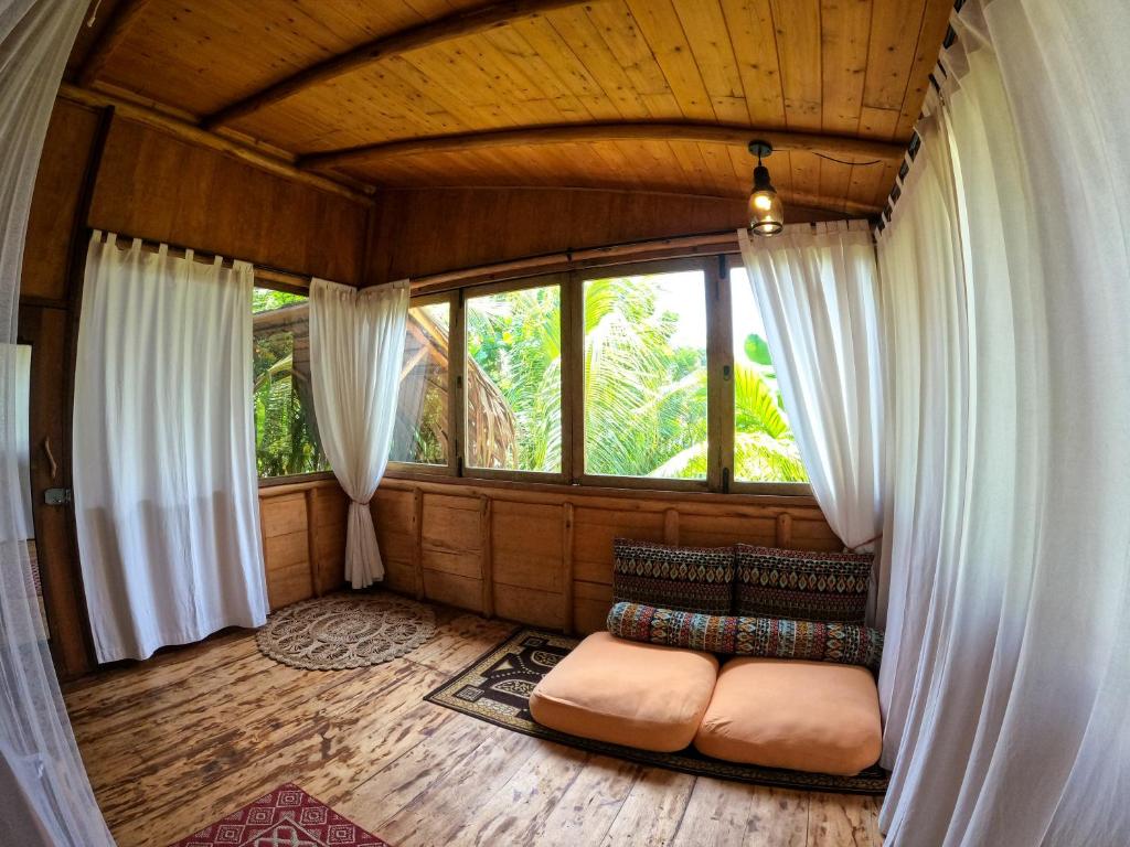 Posezení v ubytování Monsoon Eco Resort - Whisky point Arugambay
