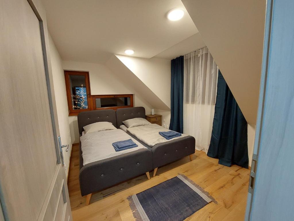 Postel nebo postele na pokoji v ubytování Mýto Apartments BERGMAX, Ski Jasná Chopok 10min transit - Resort Mýto Apartments, parking free
