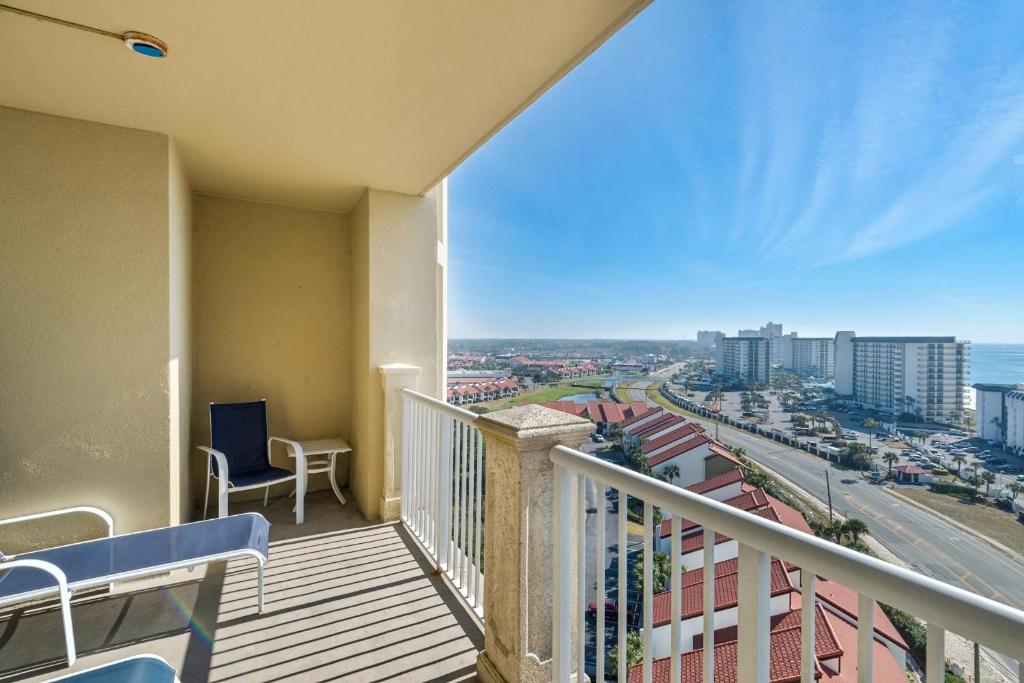 a balcony with a view of a city at Grand Panama 2-705 in Panama City Beach