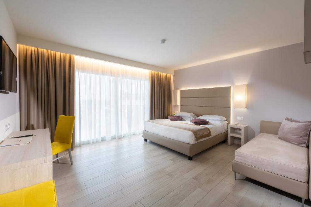 Voodi või voodid majutusasutuse AQA Palace toas