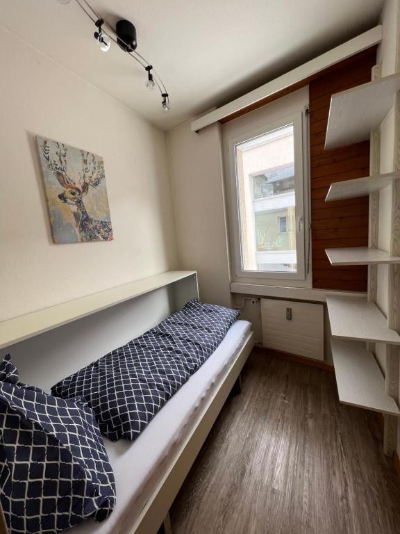 Postel nebo postele na pokoji v ubytování Ferienwohnung Dorfzentrum