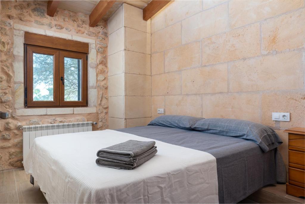 Postel nebo postele na pokoji v ubytování VILLA SON BRUN