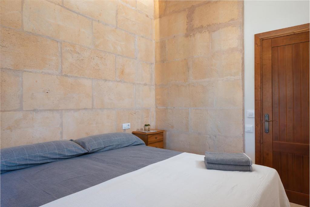 Postel nebo postele na pokoji v ubytování VILLA SON BRUN
