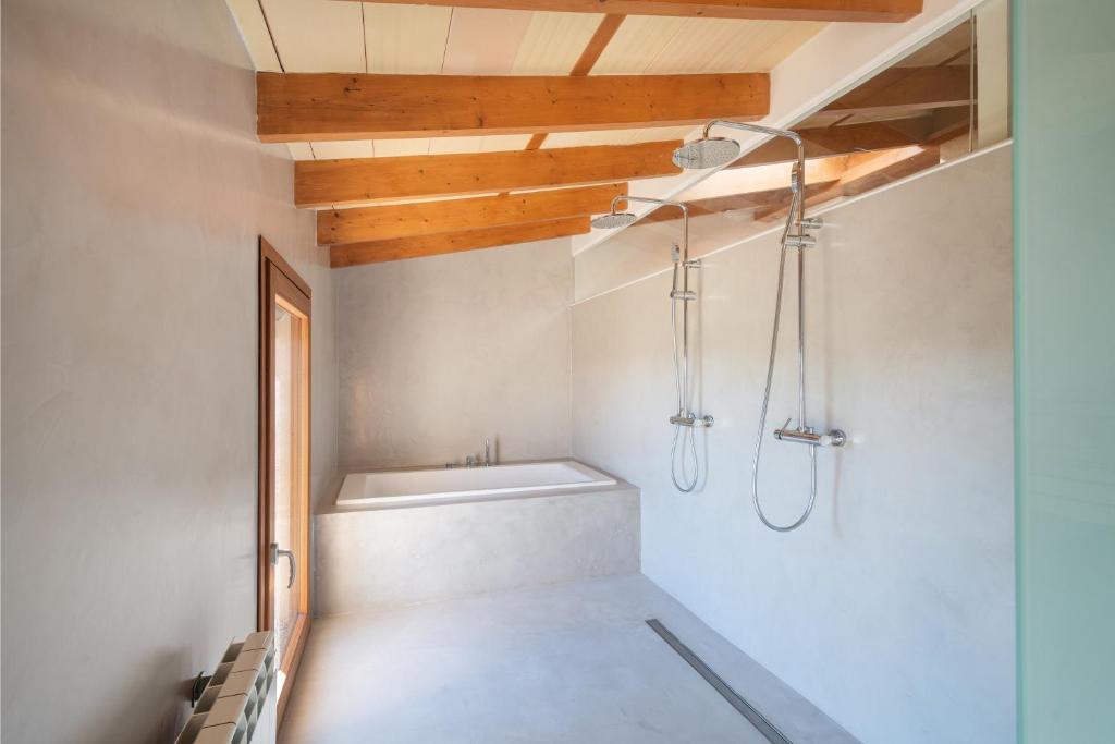Postel nebo postele na pokoji v ubytování VILLA SON BRUN