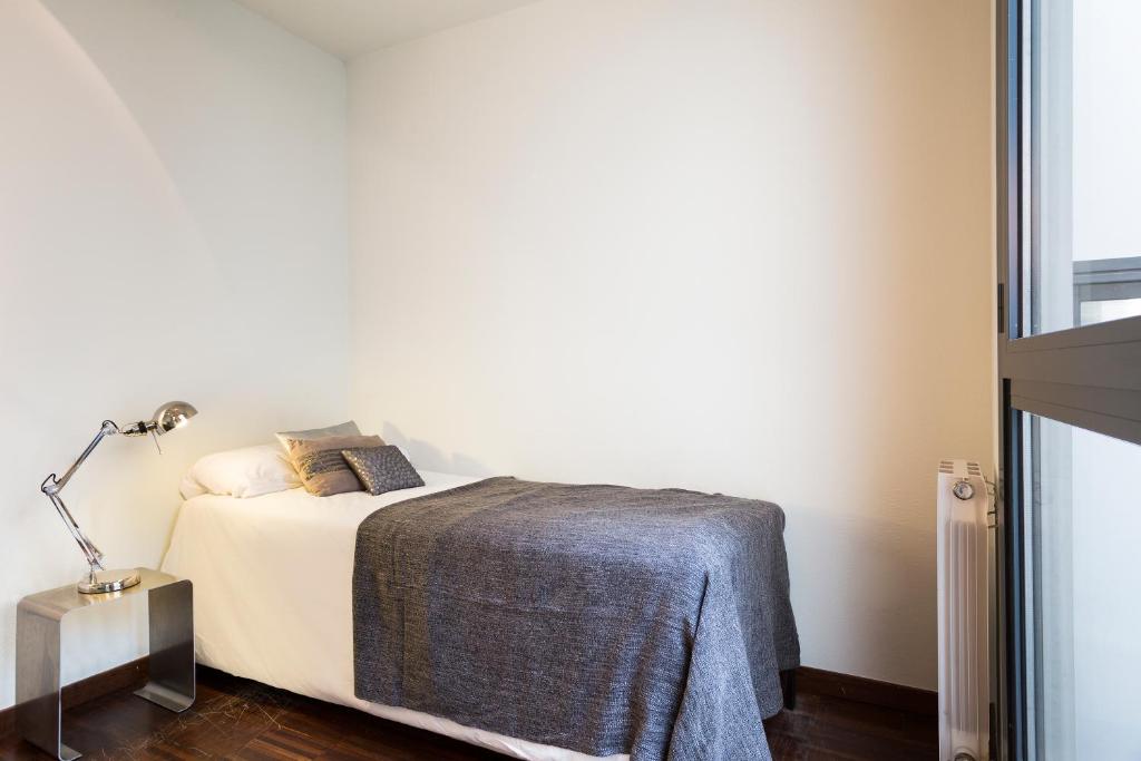 Posteľ alebo postele v izbe v ubytovaní My Space Barcelona Executive Apartments Center