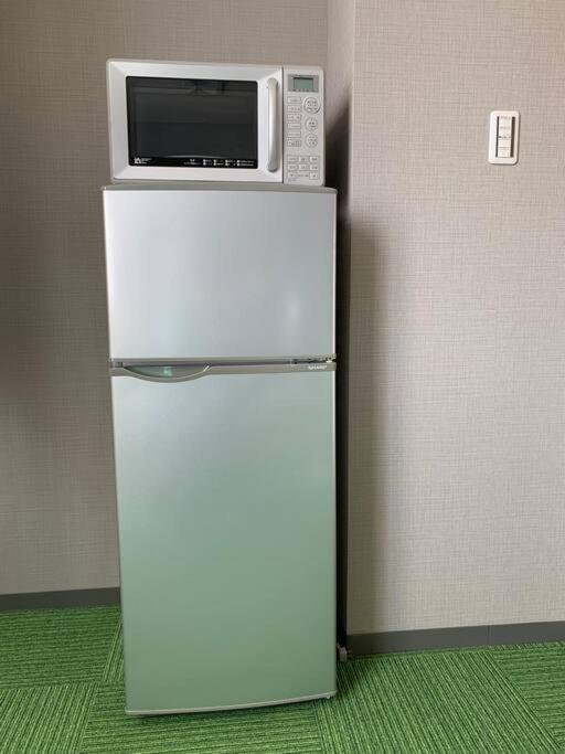 kdy ｽﾃｲﾊｳｽ 2段ベットの広い客室みんな一緒に泊まれるにあるキッチンまたは簡易キッチン