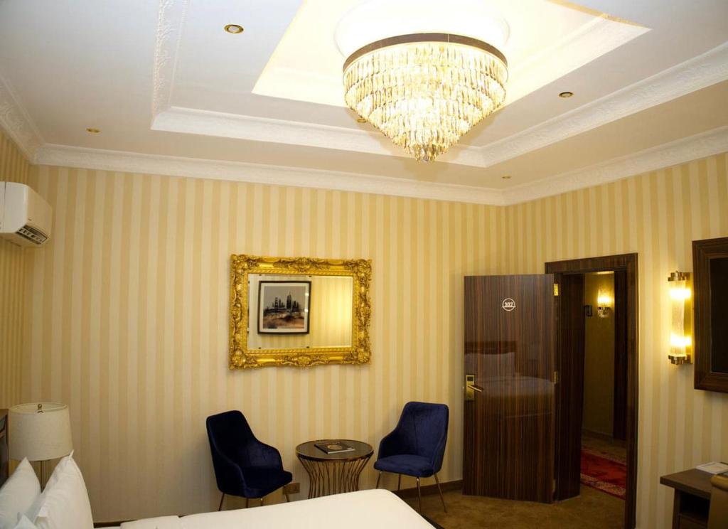 Postel nebo postele na pokoji v ubytování NO.1 HOTEL