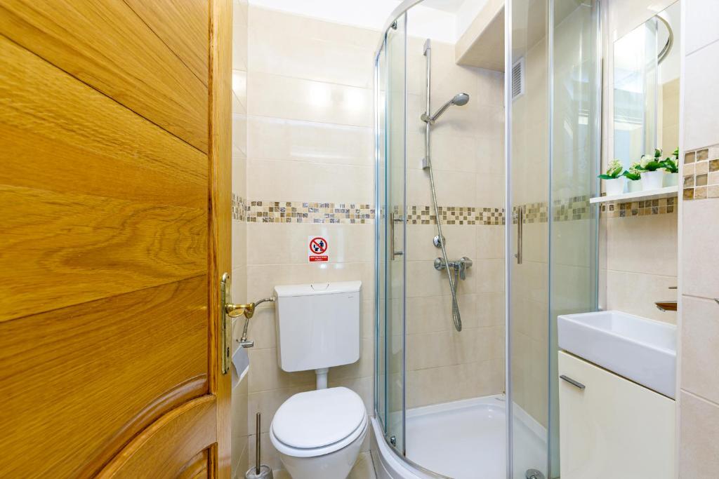 Łazienka w obiekcie Apartments DIDO