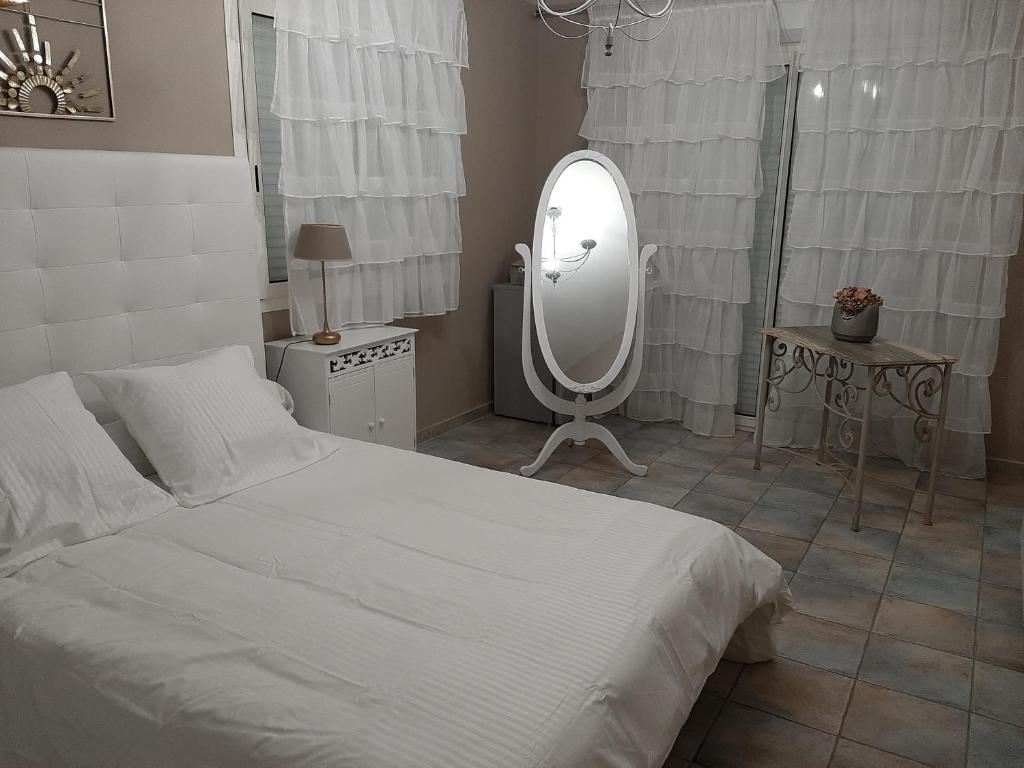 Postel nebo postele na pokoji v ubytování Chambre d'hote Casa Tozza