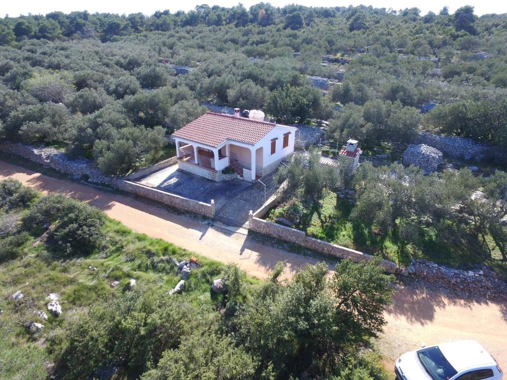 an aerial view of a house in a field at Holiday Home Nada in Sali