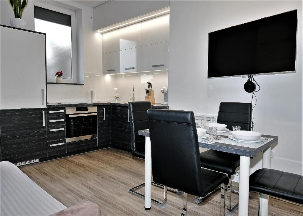 Kuchyň nebo kuchyňský kout v ubytování APARTMA NIKA