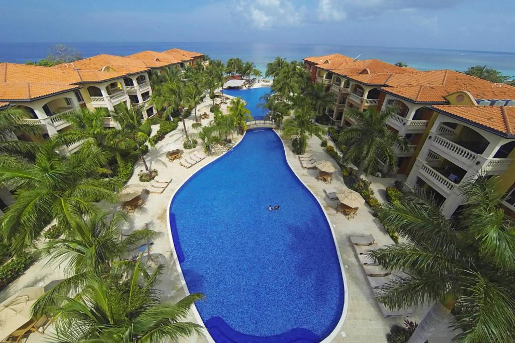 an aerial view of a pool at a resort at Infinity Bay, Spa & Beach Resort in West Bay