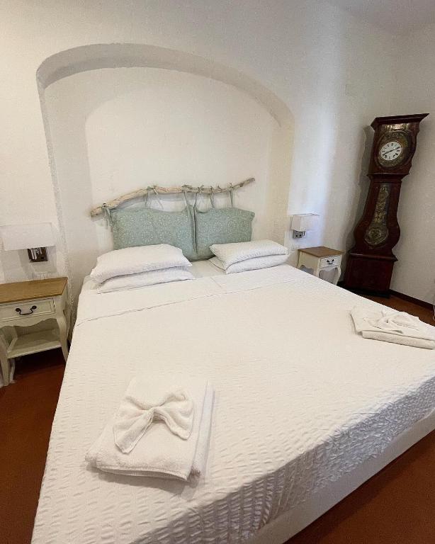 Postel nebo postele na pokoji v ubytování Dolce Vita Suite Alghero