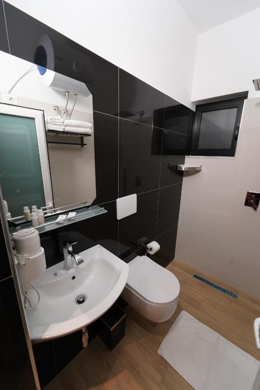 Koupelna v ubytování SR99 Hotel