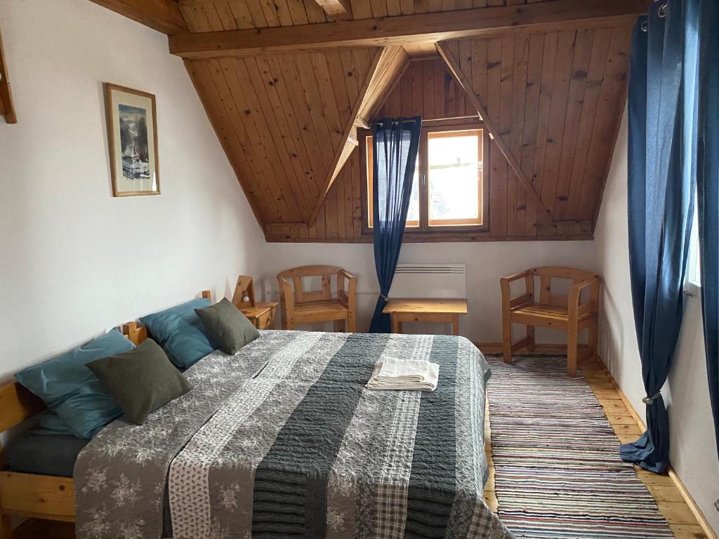 Postel nebo postele na pokoji v ubytování Casa Bucataria Fonix