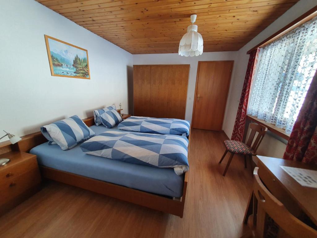 Postel nebo postele na pokoji v ubytování Plaun Grond