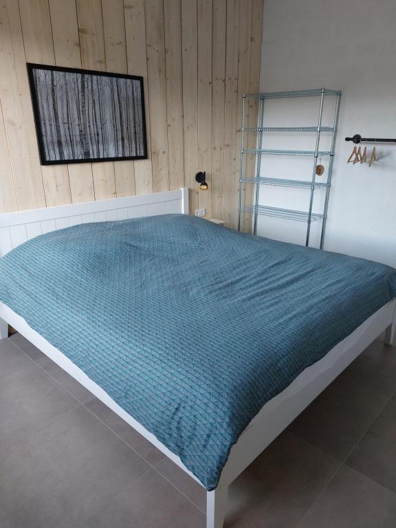 A bed or beds in a room at Champs Erez&eacute;e , genieten in elk seizoen