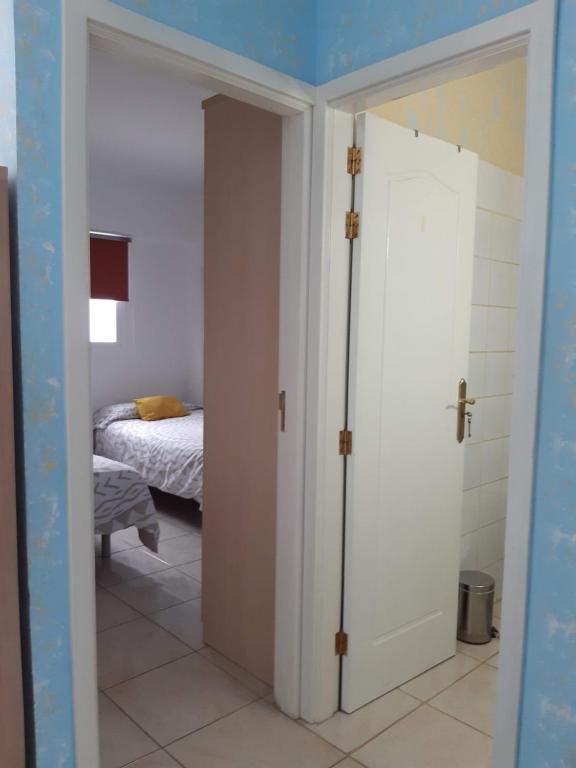 Posteľ alebo postele v izbe v ubytovaní Apartamento La Aldea Pueblo Gran Canaria 2B