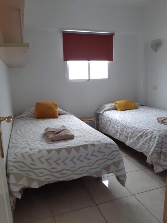 Posteľ alebo postele v izbe v ubytovaní Apartamento La Aldea Pueblo Gran Canaria 2B