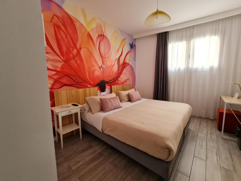 Posteľ alebo postele v izbe v ubytovaní Huelva Art