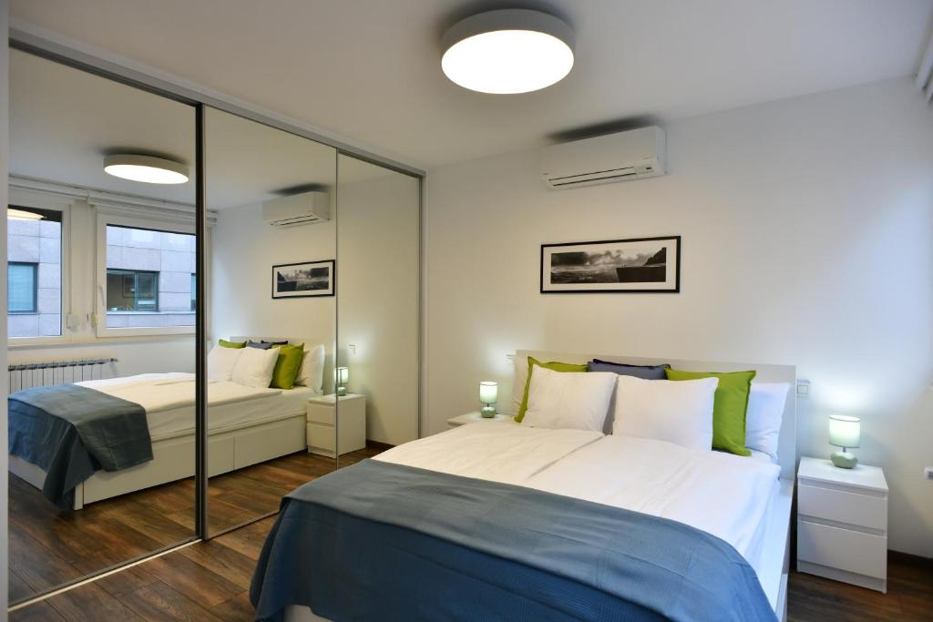 Posteľ alebo postele v izbe v ubytovaní Apartment Larissa