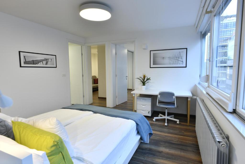 Posteľ alebo postele v izbe v ubytovaní Apartment Larissa