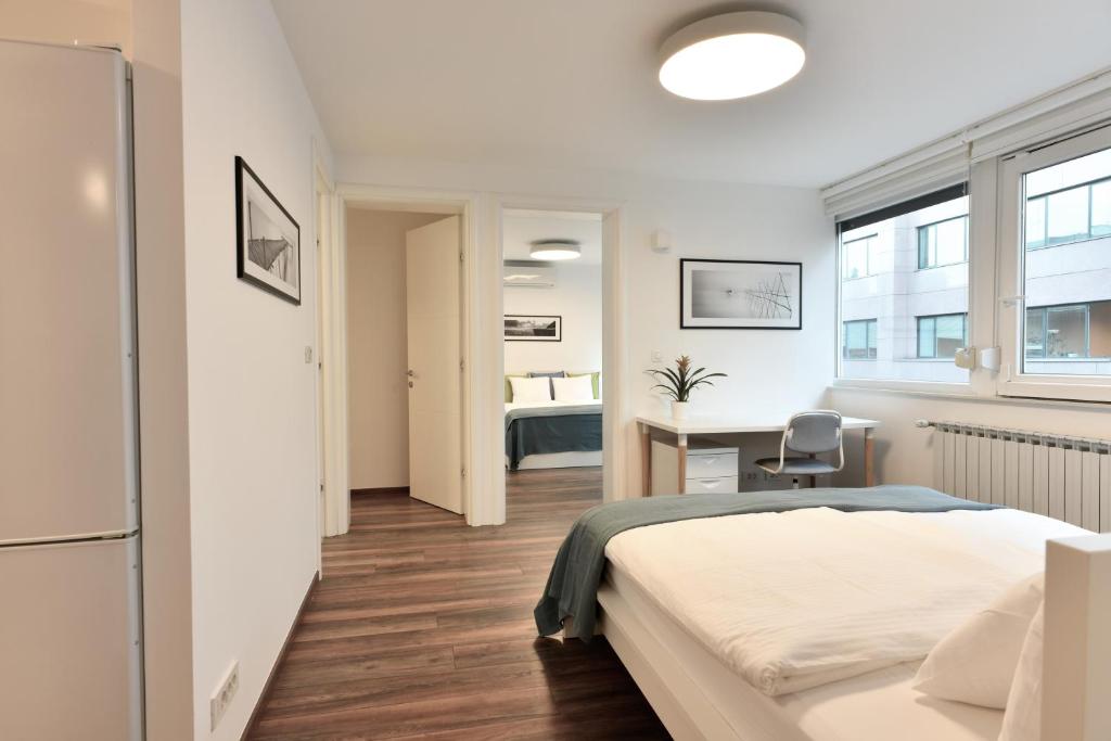 Posteľ alebo postele v izbe v ubytovaní Apartment Larissa