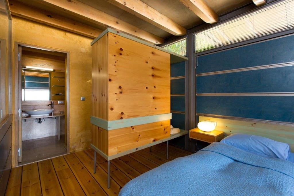 Postel nebo postele na pokoji v ubytování Ravdoucha Epavlis - Luxury Private Villas