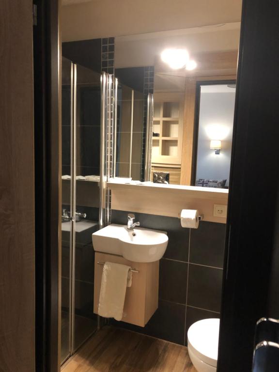 Koupelna v ubytování Arte-locum Apartamenty przy Rynku