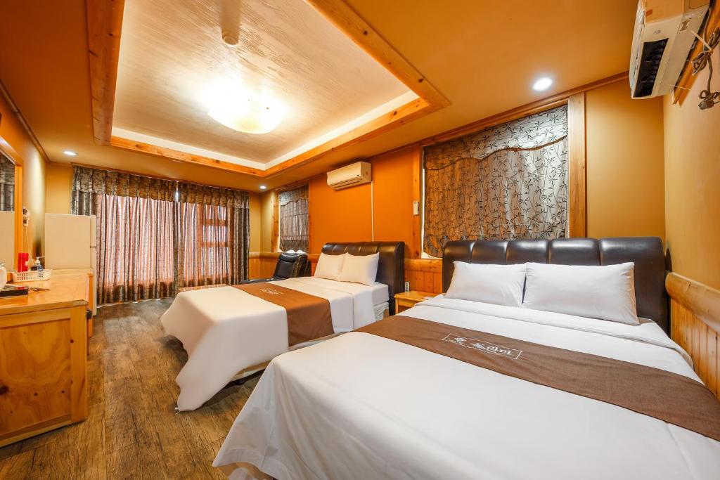 Postel nebo postele na pokoji v ubytování Drama Motel