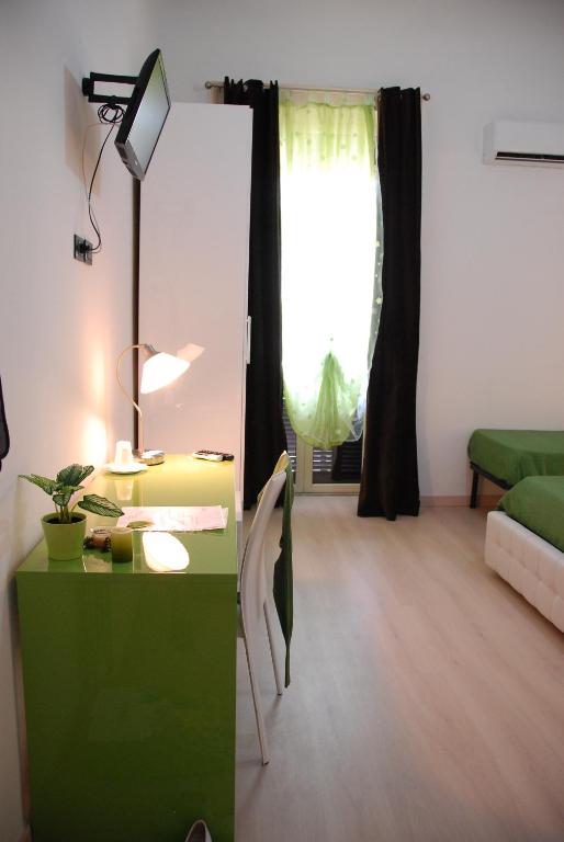 Łóżko lub łóżka w pokoju w obiekcie Messina41 Hotel
