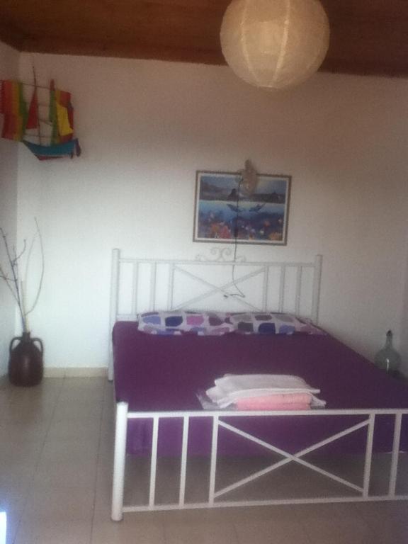 Postel nebo postele na pokoji v ubytování Stamatis Rooms