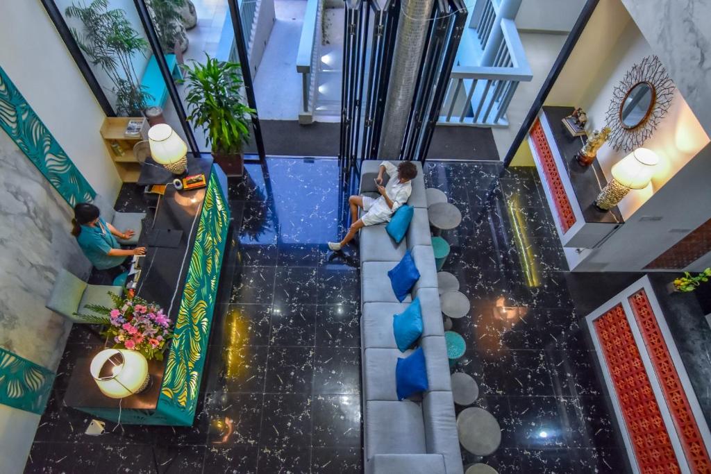 an overhead view of a wedding ceremony in a building at Norn Talay Surin Beach Phuket in Surin Beach