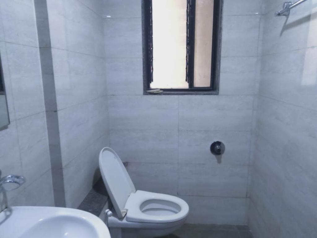 Koupelna v ubytování Sai Heera Residency Shirdi